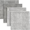 set of four block print charcoal napkins: one of each style.