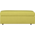 julius storage ottoman in grass.