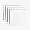 set of four dinner napkins.